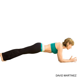 Activating the core in plank pose.